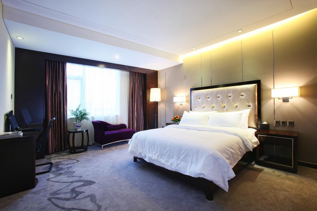 Xichang Minshan Hotel Номер фото