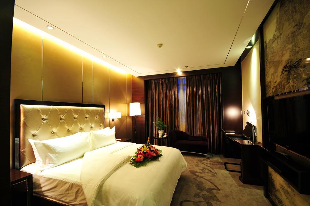 Xichang Minshan Hotel Номер фото